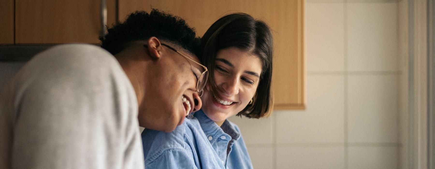 a man and woman kissing