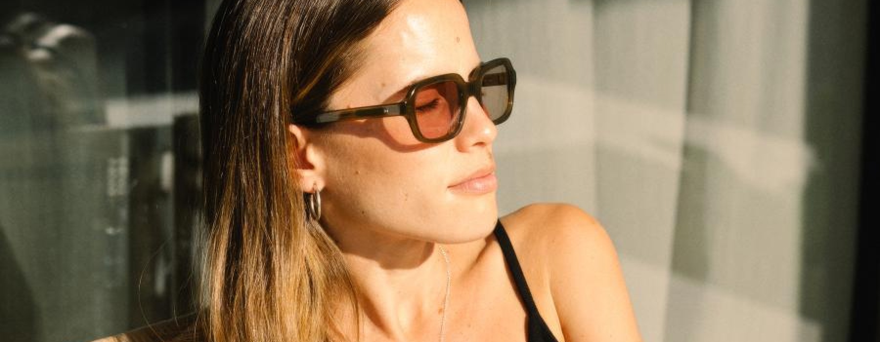 a woman wearing sunglasses